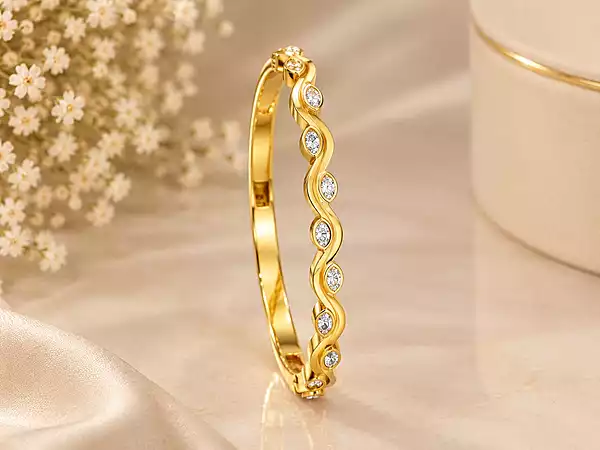Gold Tone Crystal Studded Wave Kada Bracelet
