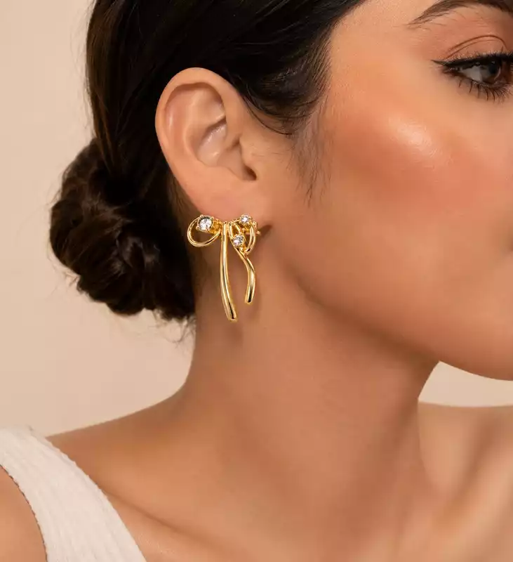 Gold Tone Crystal Ribbon Earrings